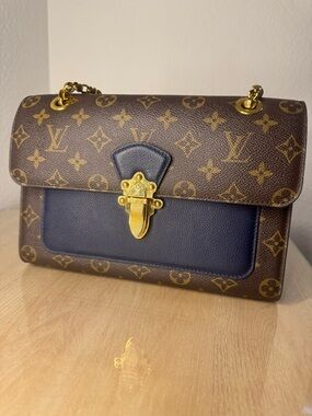 Louis Vuitton Monogram Victoire Canvas Shoulder Bag